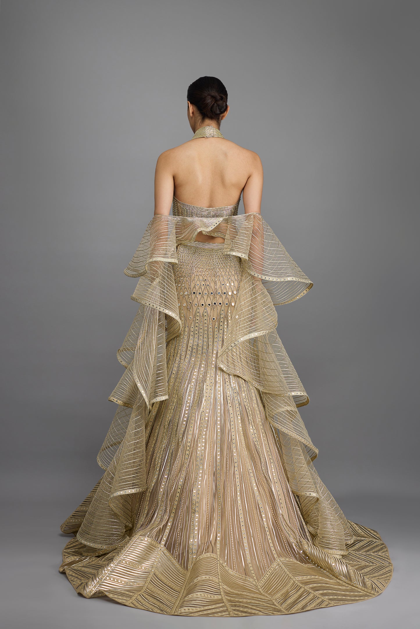 Metallic Halter Top And Fishtail Skirt With Drape