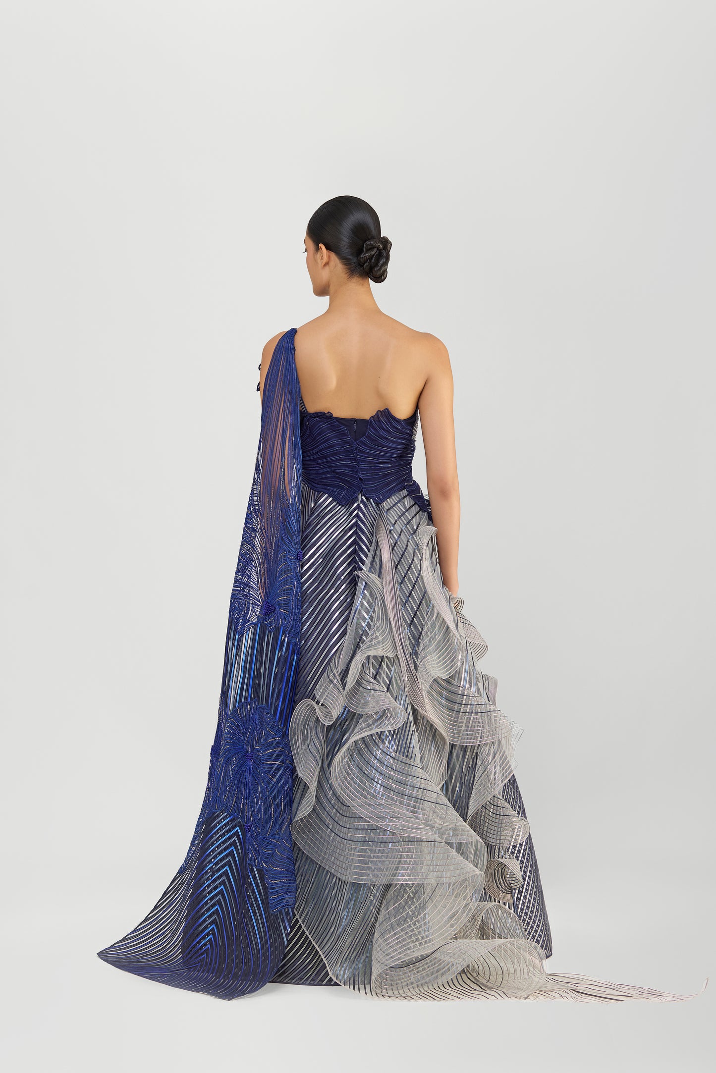 Structured Corded Coral Off The Shoulder Gown With A Metallic Fluted Tulle Skirt And Two Drapes