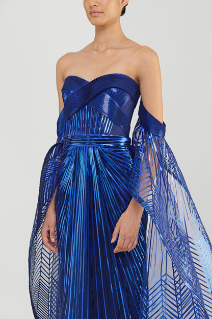 Metallic Micropleated Off The Shoulder Gown With Sunray Wings On Sleeves