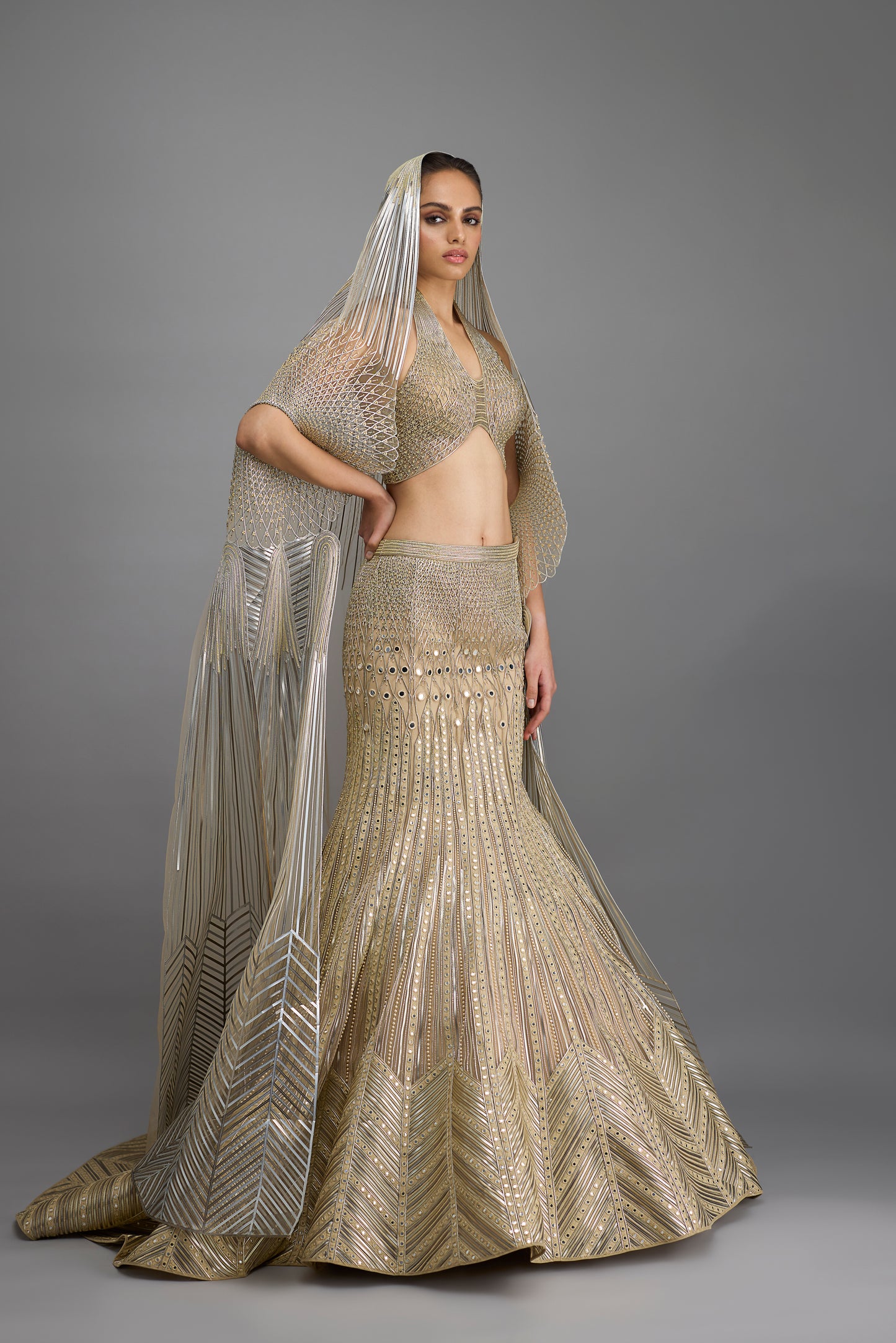 Metallic Halter Top And Fishtail Skirt With Drape