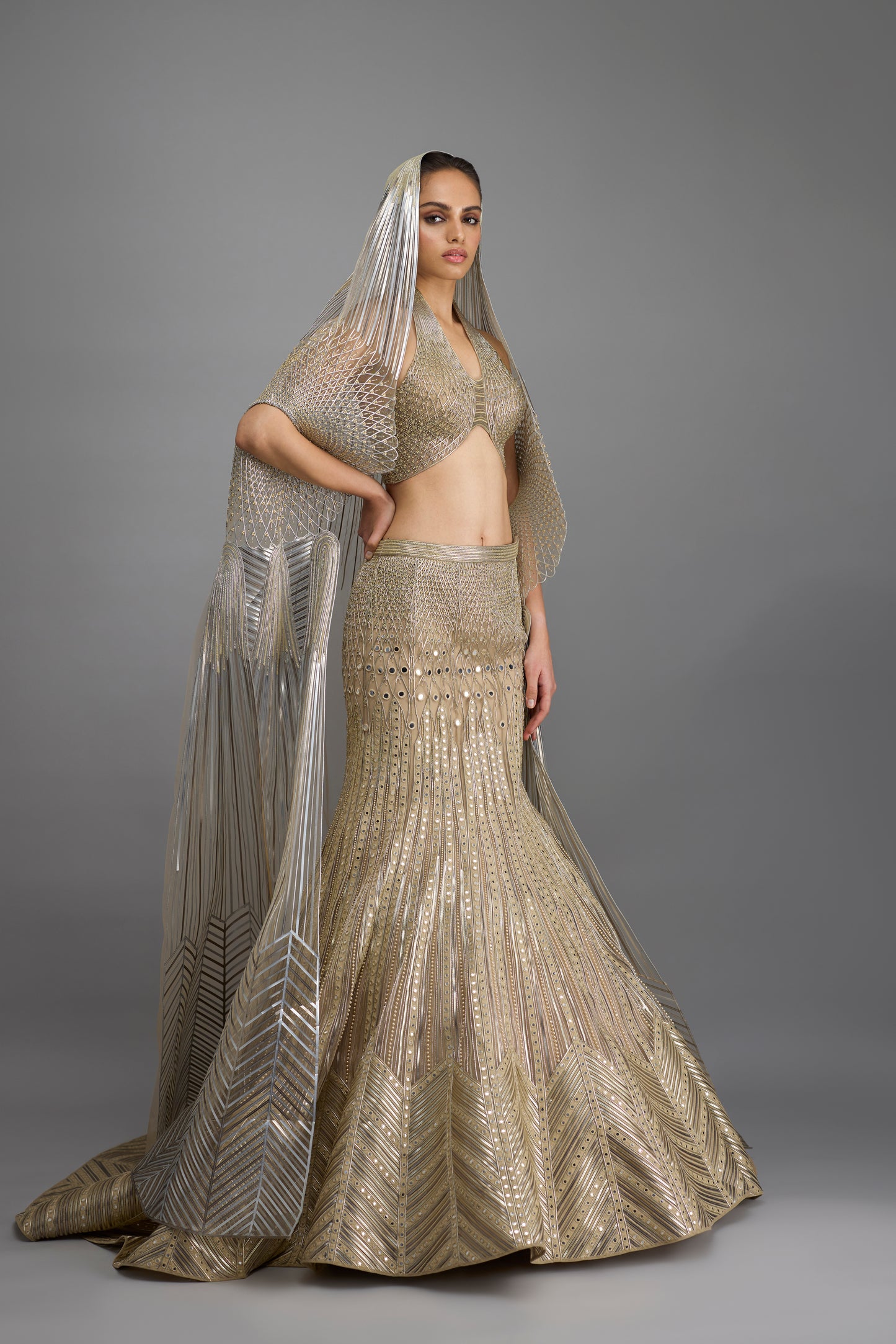 Metallic Halter Top And Fishtail Skirt With Drape