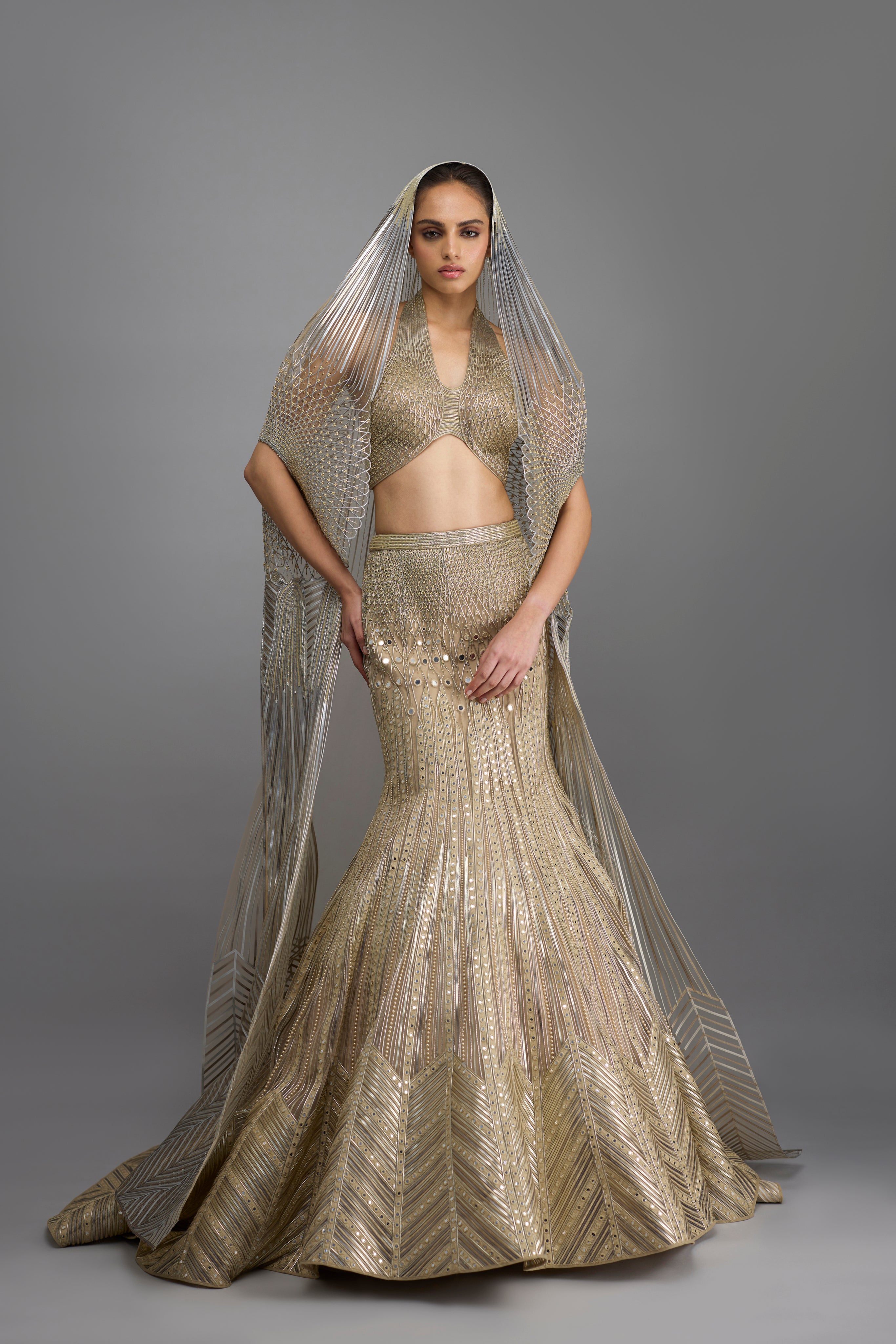 Metallic Halter Top And Fishtail Skirt With Drape