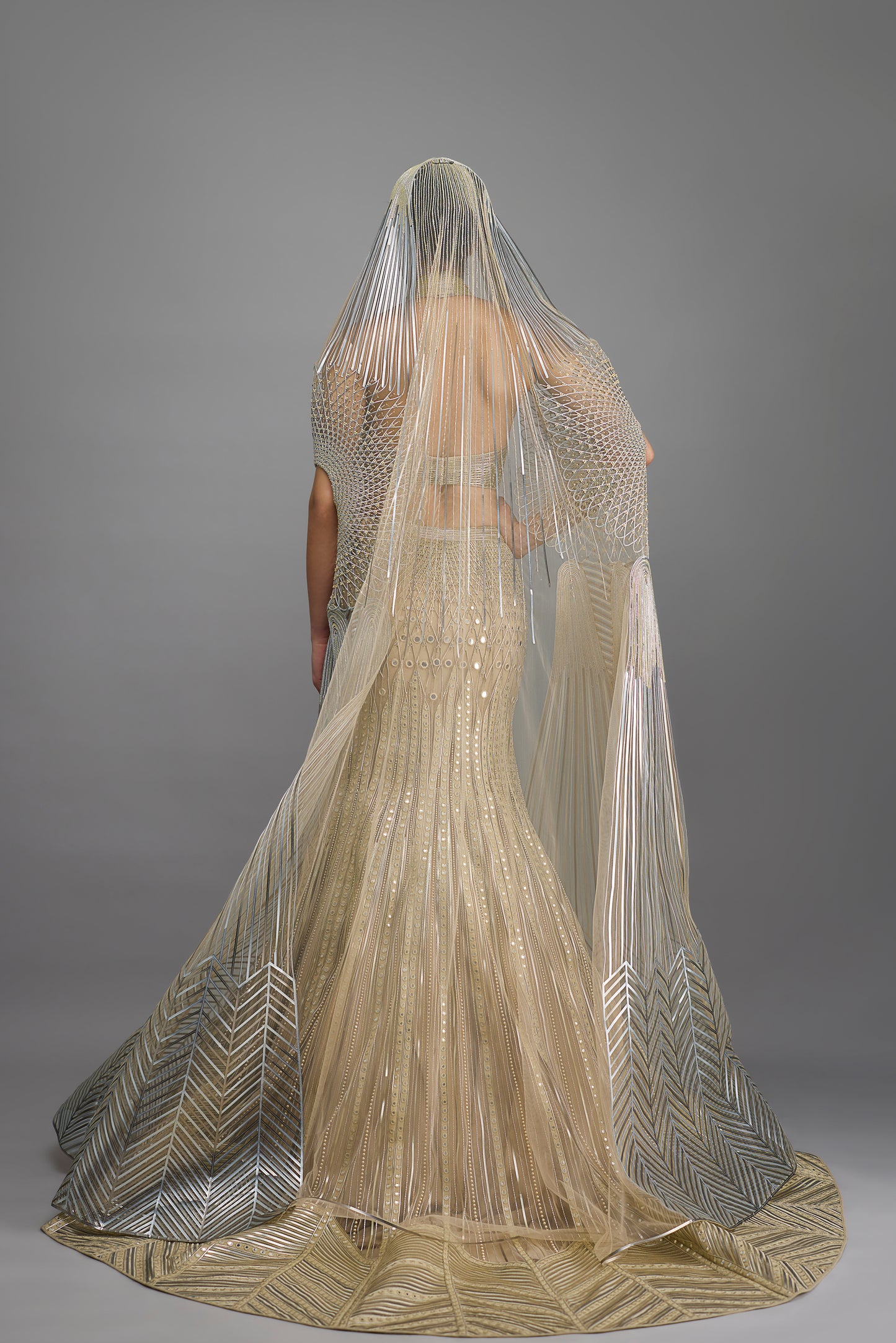 Metallic Halter Top And Fishtail Skirt With Drape