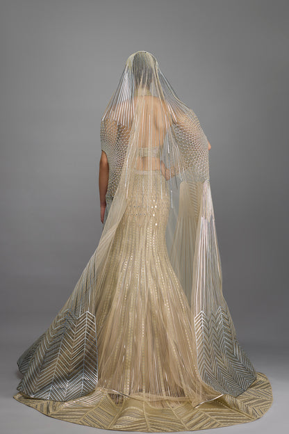 Metallic Halter Top And Fishtail Skirt With Drape