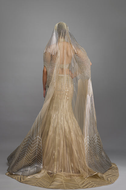 Metallic Halter Top And Fishtail Skirt With Drape