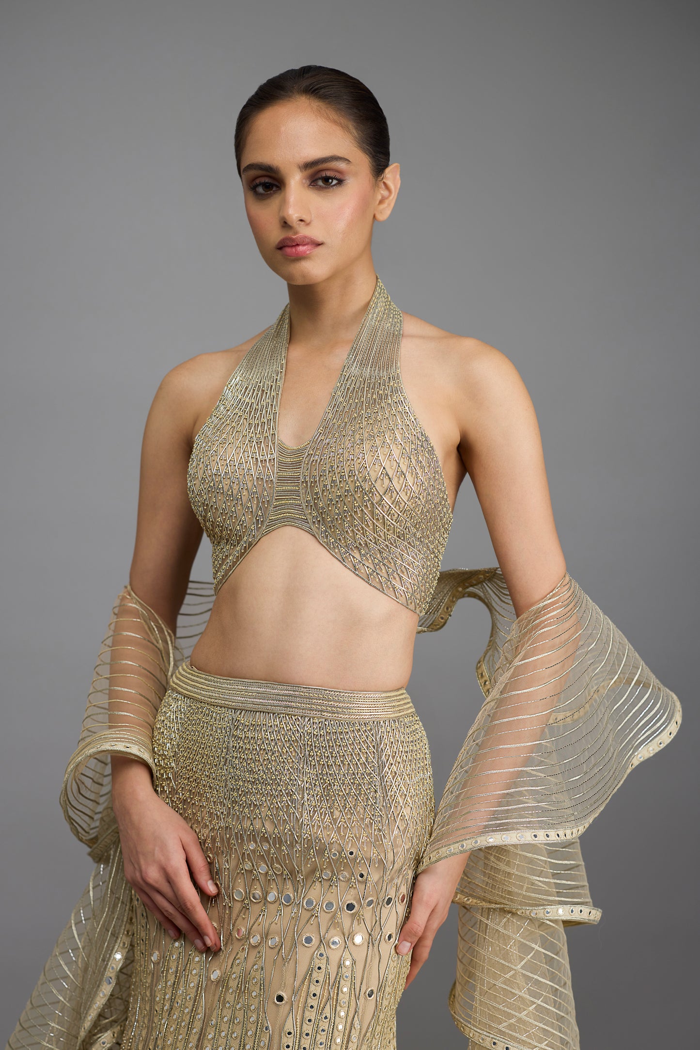 Metallic Halter Top And Fishtail Skirt With Drape