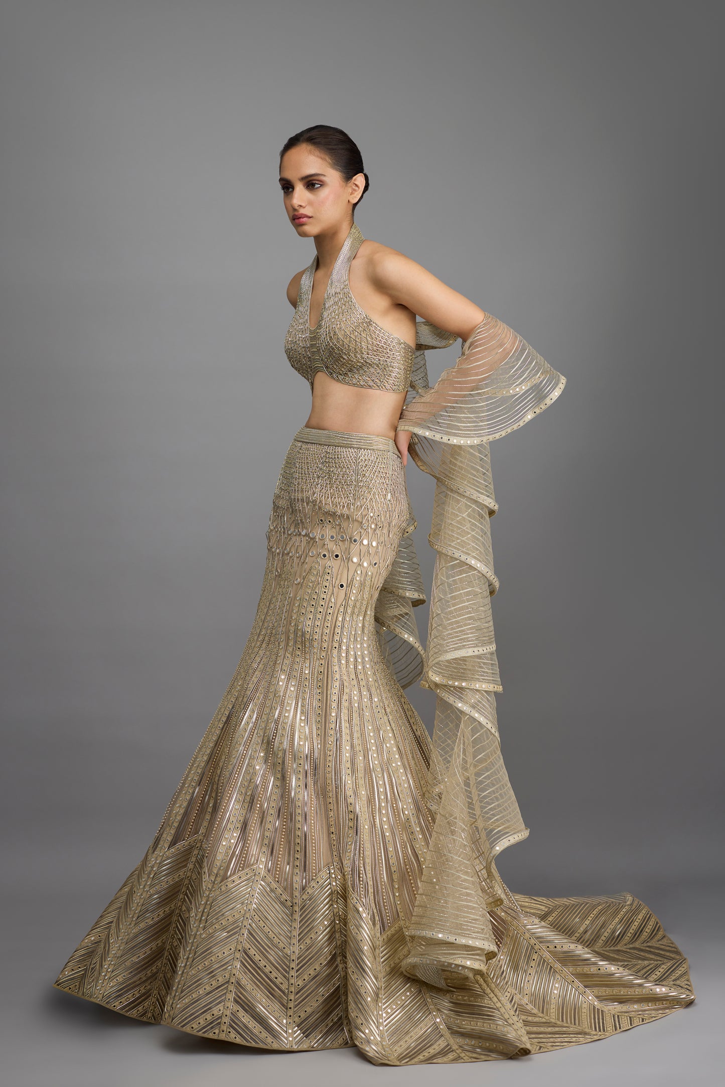 Metallic Halter Top And Fishtail Skirt With Drape