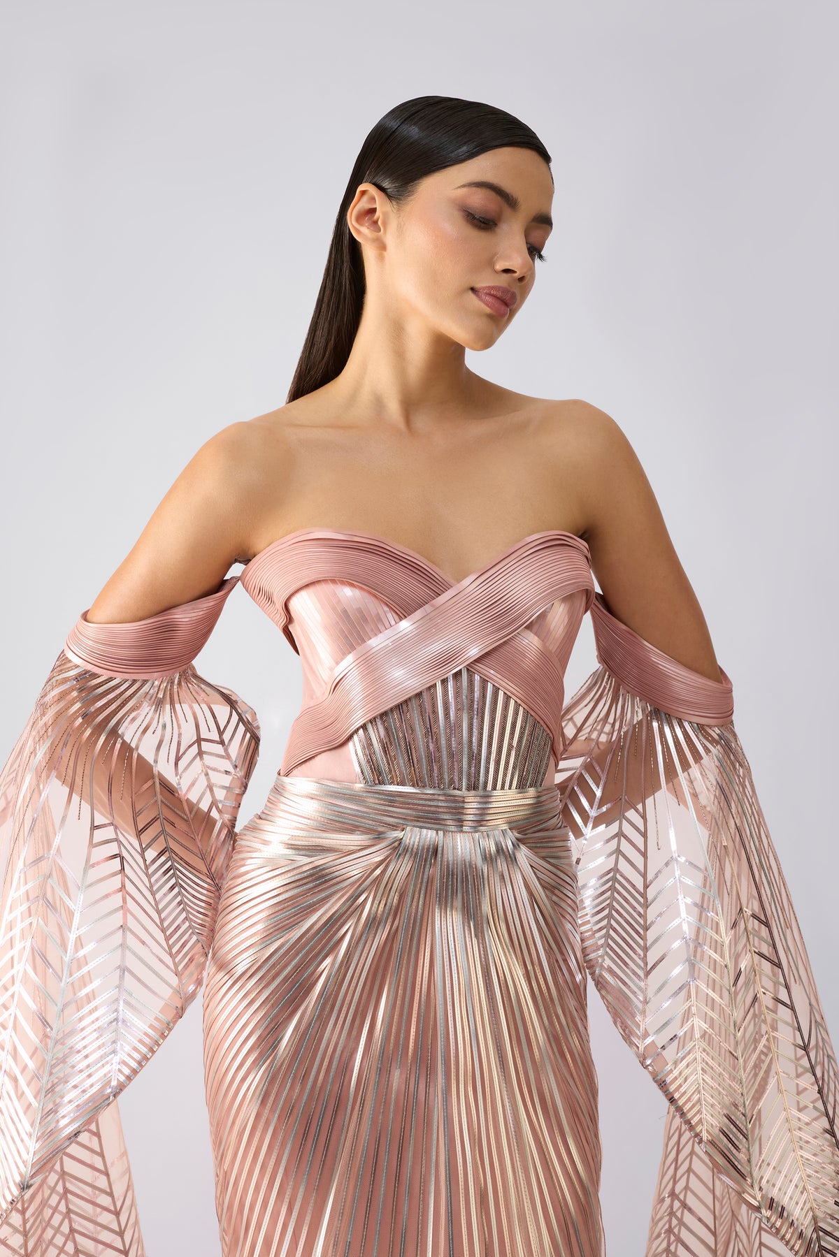 Metallic Gown With Sunray Wings