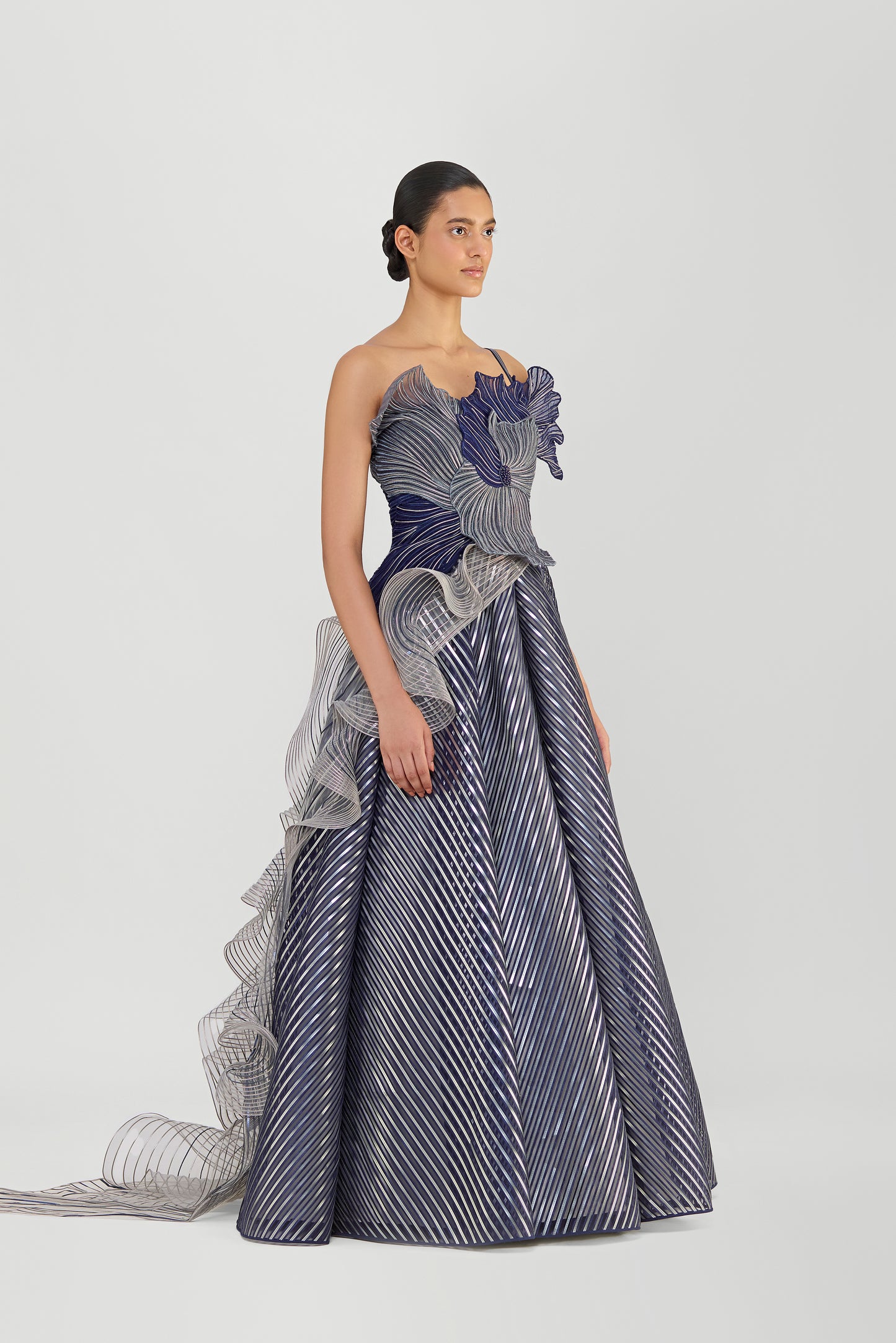 Structured Corded Coral Off The Shoulder Gown With A Metallic Fluted Tulle Skirt And Two Drapes